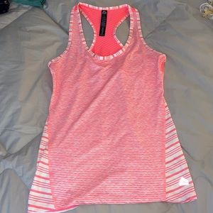 Orange and white striped workout top! In perfect condition! Size small